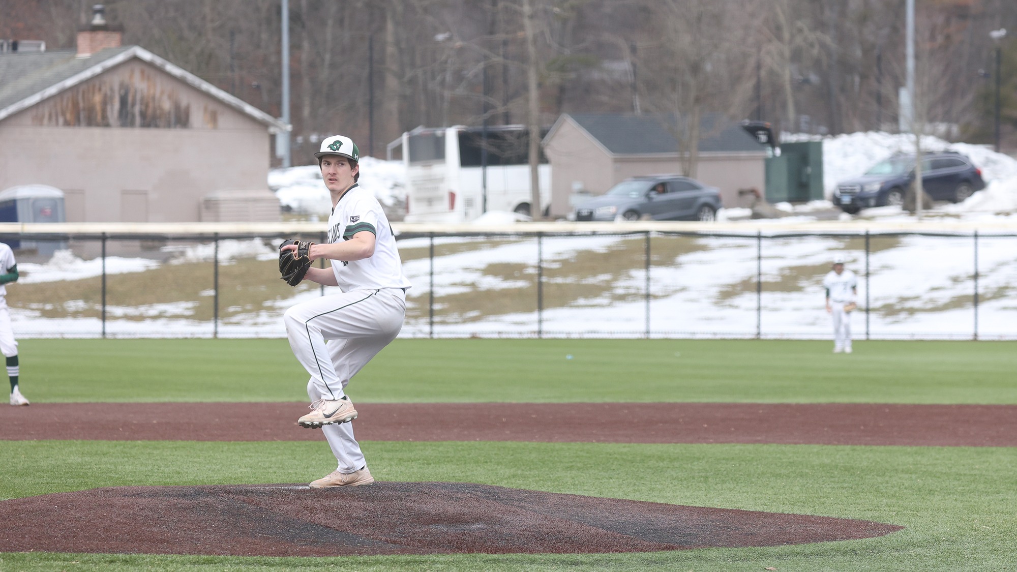 Carter Chapman winding up to throw a pitch on the mound