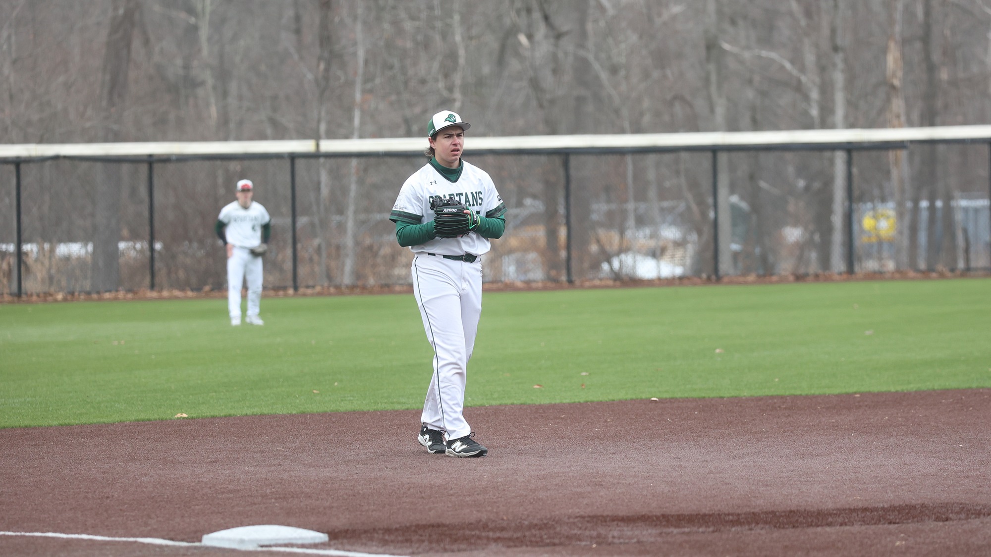 Josh Misiaszek waiting at third for the ball to be put in play