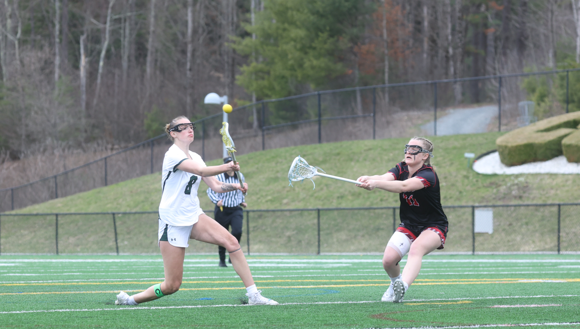 Phoebe Loomis takes shot (eventual goal) against Thomas College defender