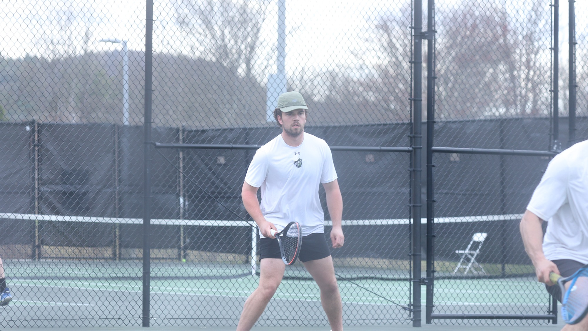 Charles Watson waiting to return a shot