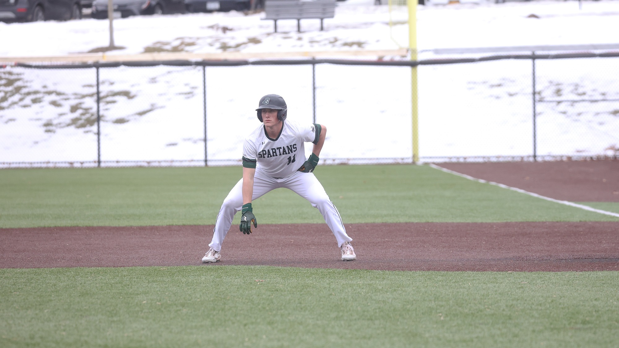 Turner Clews in a ready position to steal a base