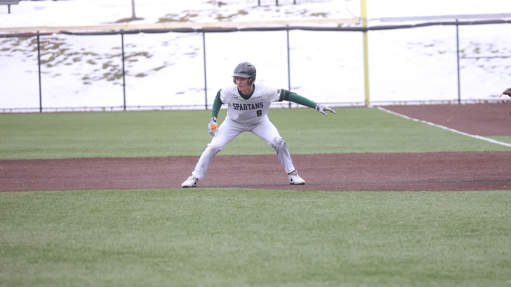 Tommie Shaw leading off first base to try and steal second