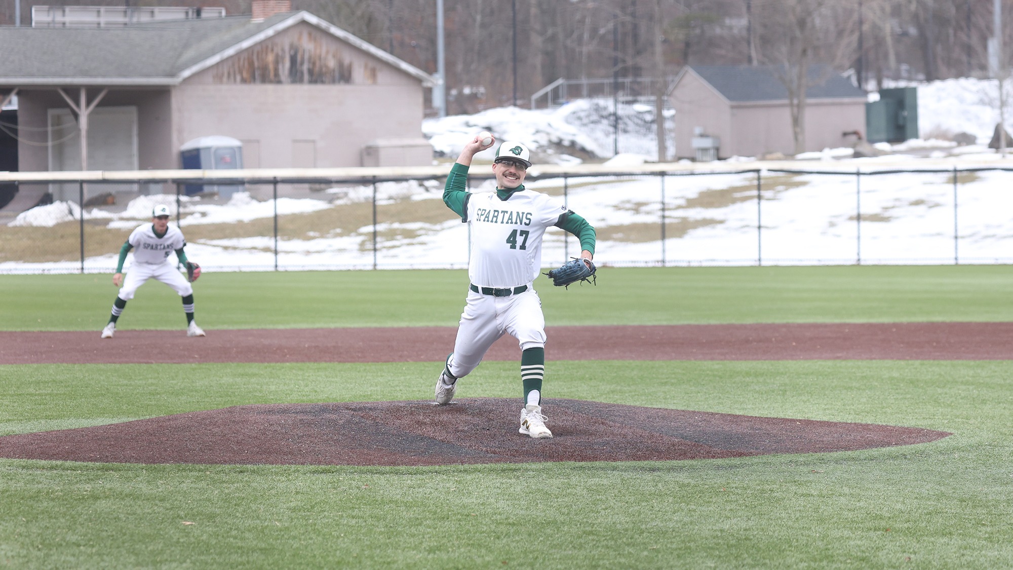 Luke Russell throwing a pitch to Plattsburgh