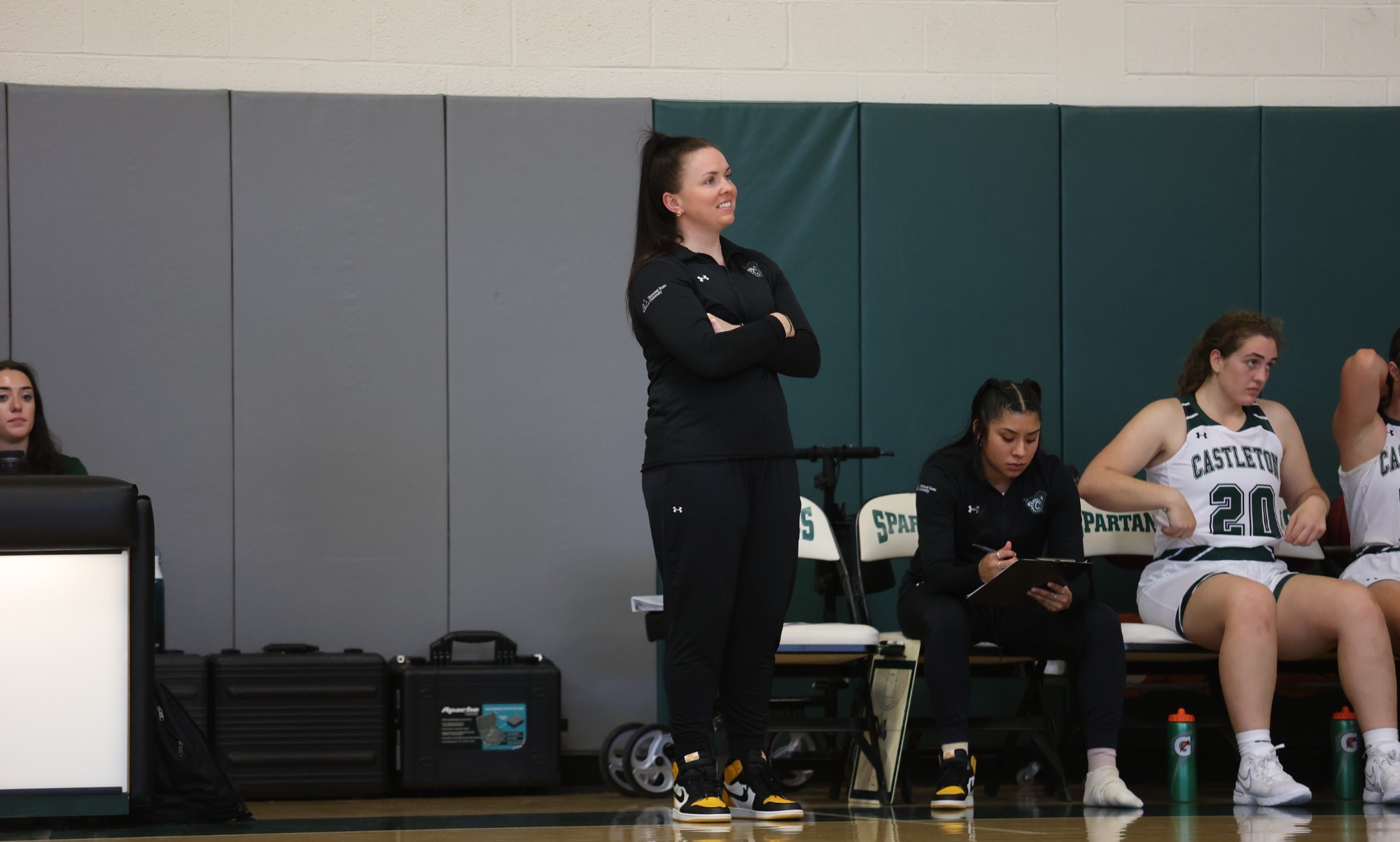 Coach Payne smiles at court