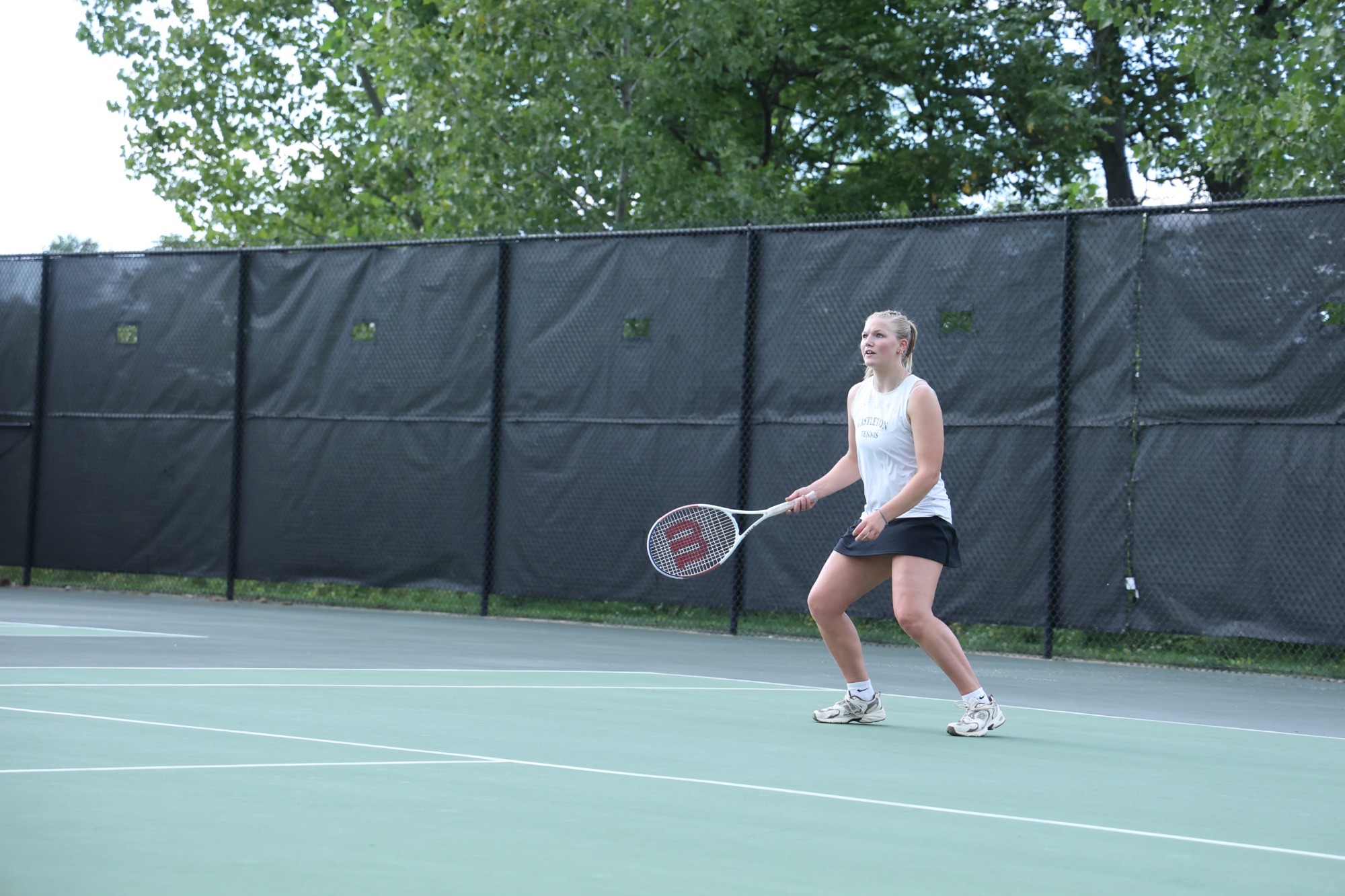Halle Hipple readying for a serve