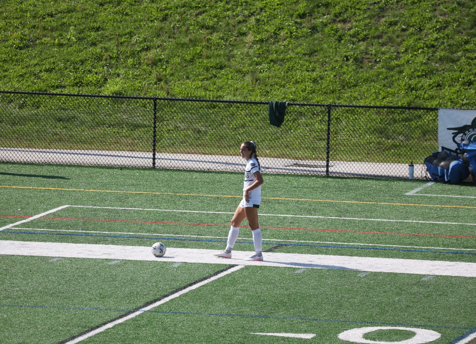 Gwen Bridges taking a free kick