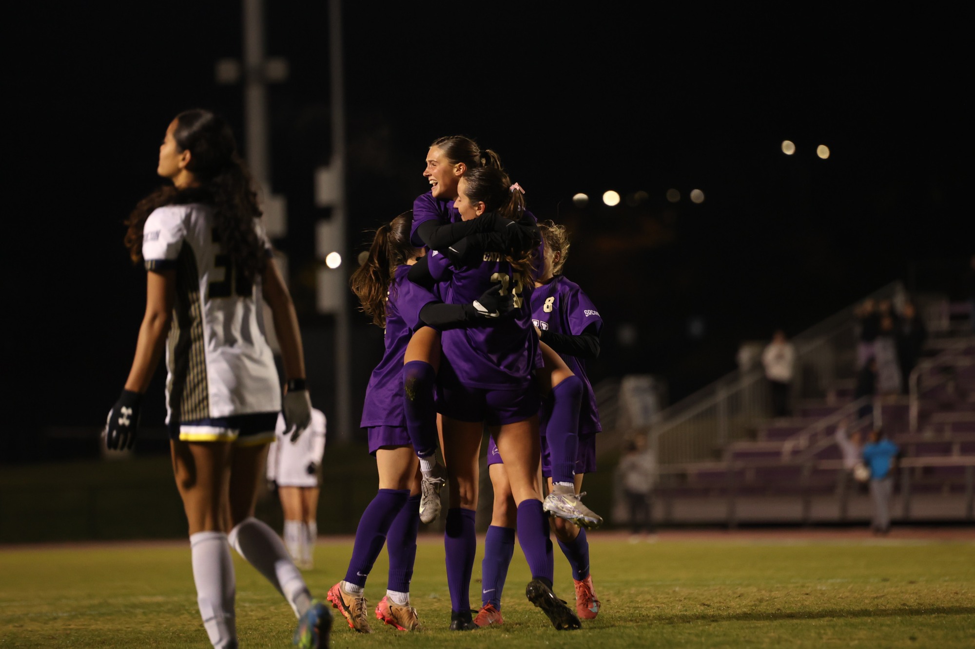 The Catamounts celebrate on another of Isabella Demarco's three goals