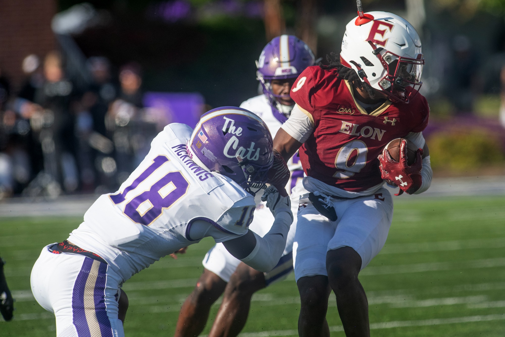 LB Ryan McKinnis (18) with a tackle against Elon on Saturday afternoon in Cullowhee.
