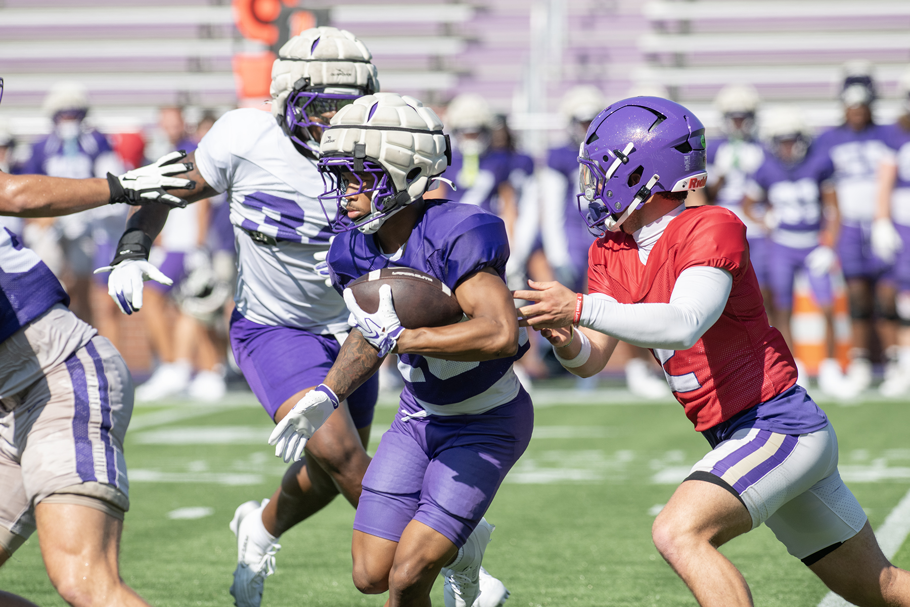 Freshman RB Jadarius Dobie with a carry in Saturday's first preseason scrimmage.