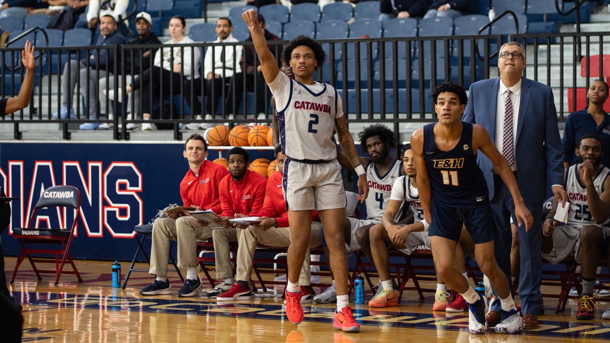 Jordan Simpson watching a three-pointer against Emory & Henry