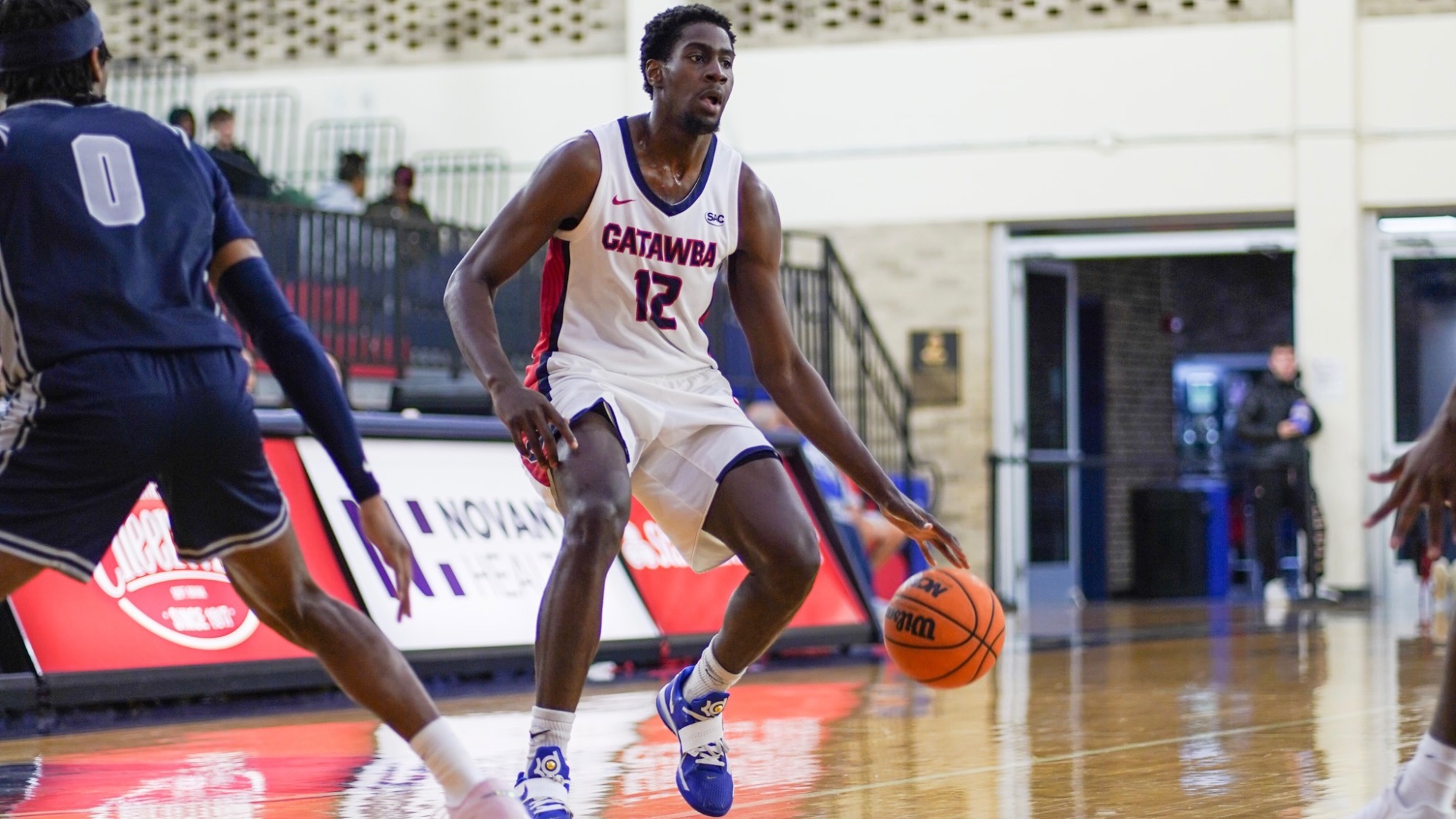 Justin Banks settling possession against Lincoln Memorial