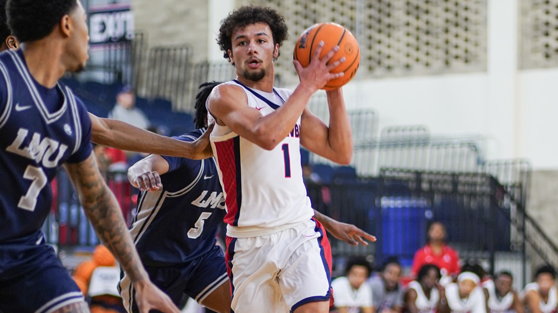 Carson Daniel looking for a passing outlet against LMU