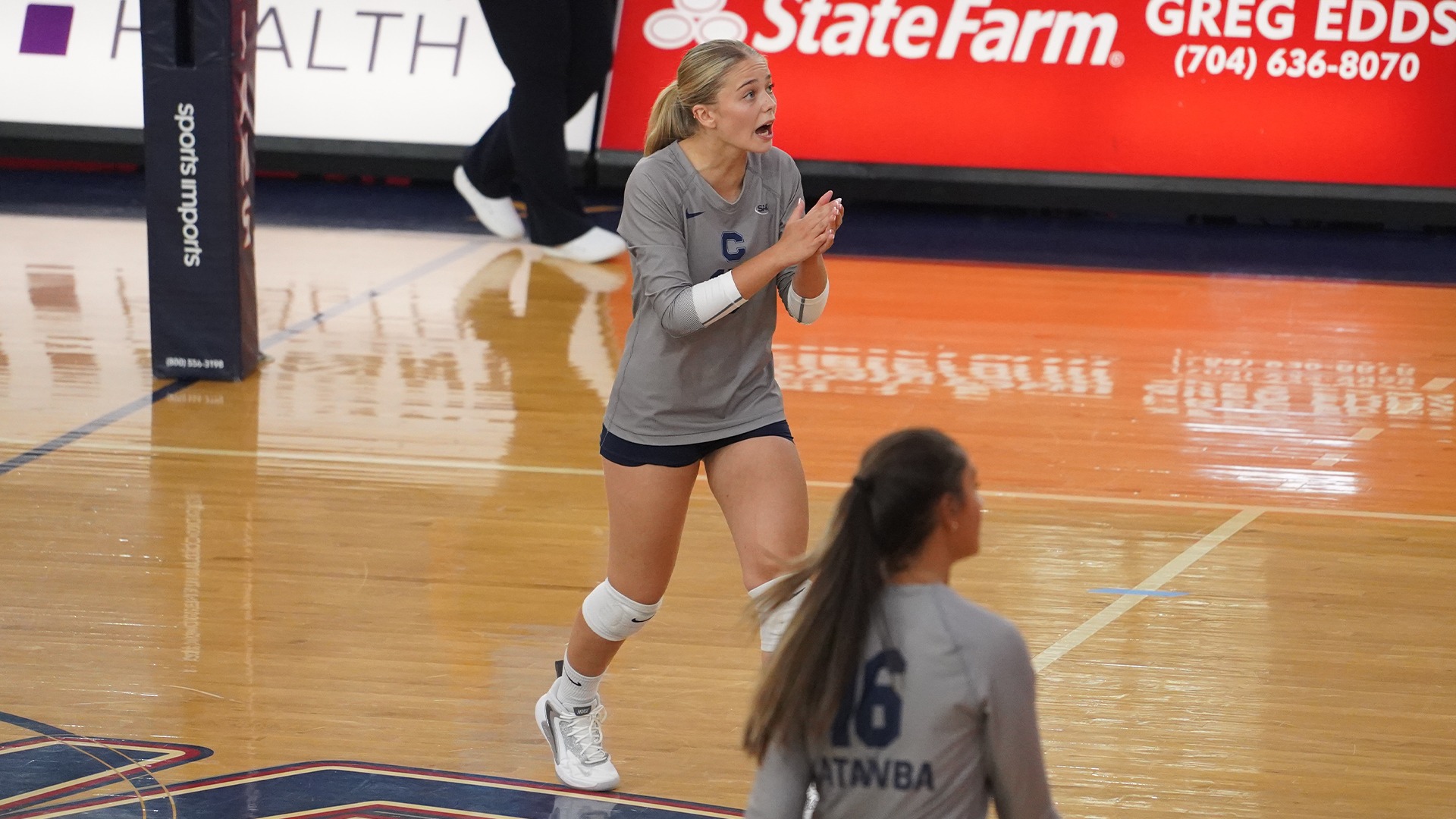 Tamie Boudot talking on the court