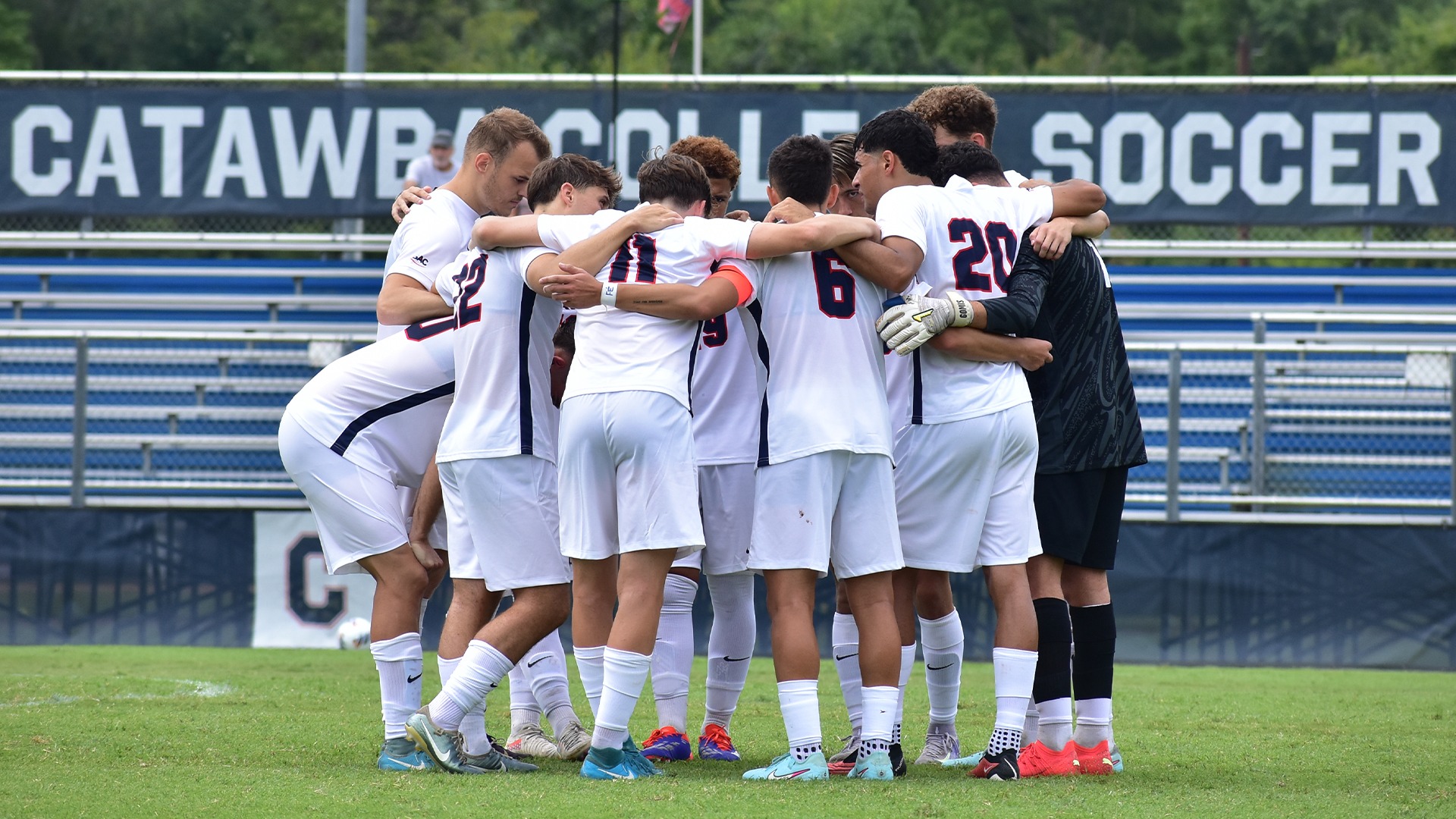 Men's Soccer huddling prior to kickoff in the exhibition vs. Averett