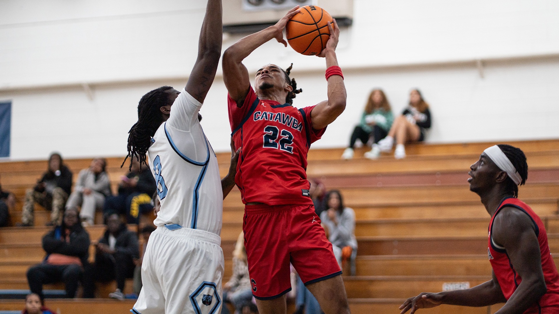 Shawn Long is contested on a layup at Livingstone