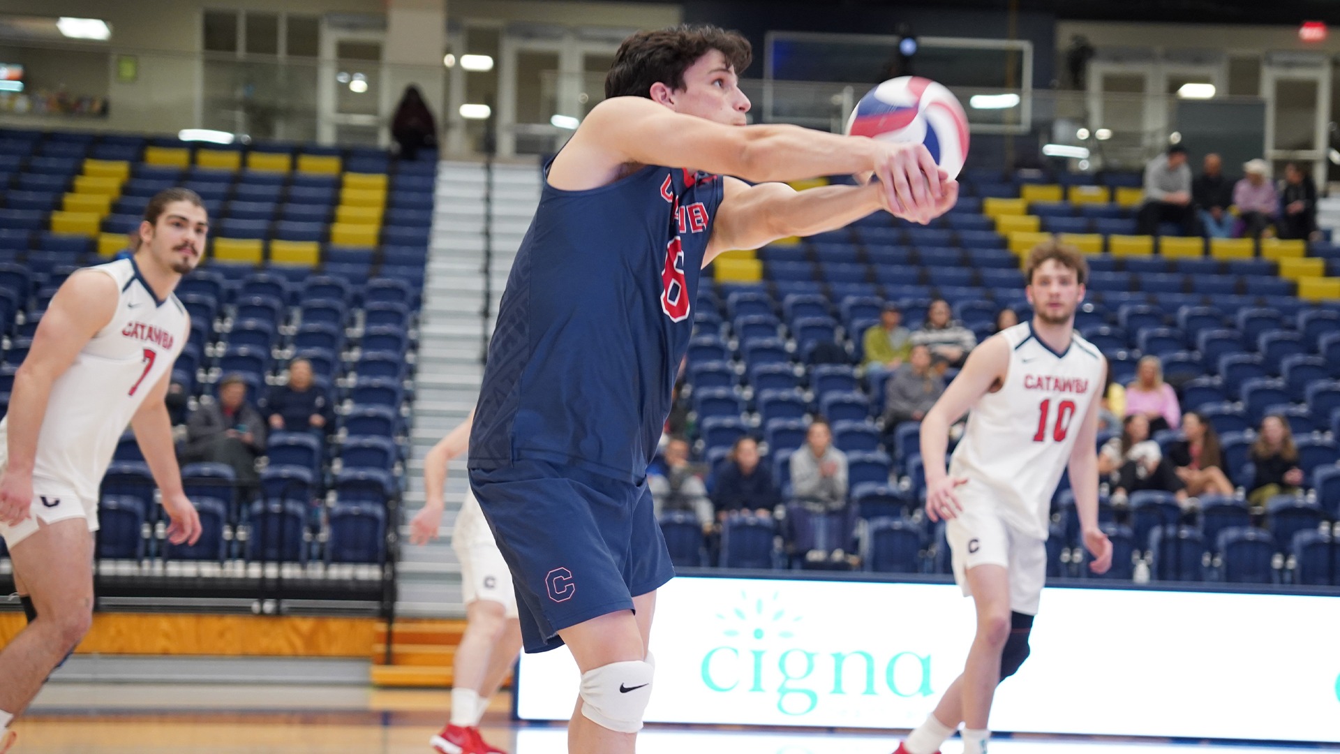Max Adkisson records a dig against Queens