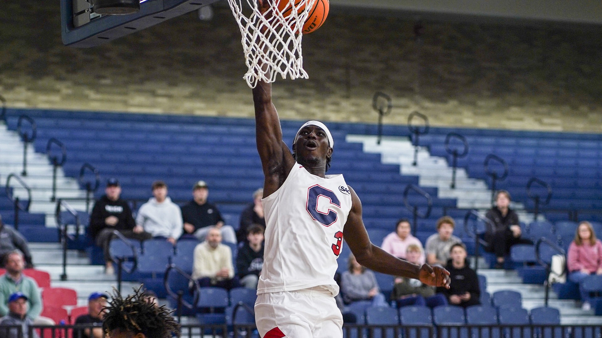 Ibra Athie elevating for a dunk against Chowan