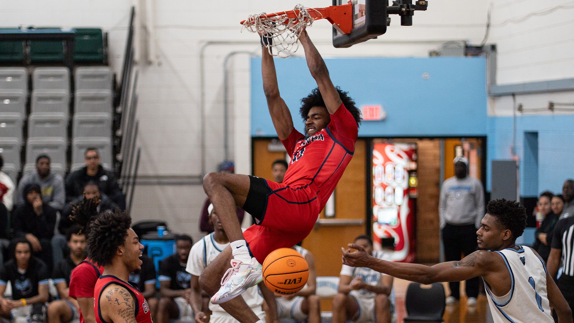 Solomon Tucker dunks the ball at Livingstone