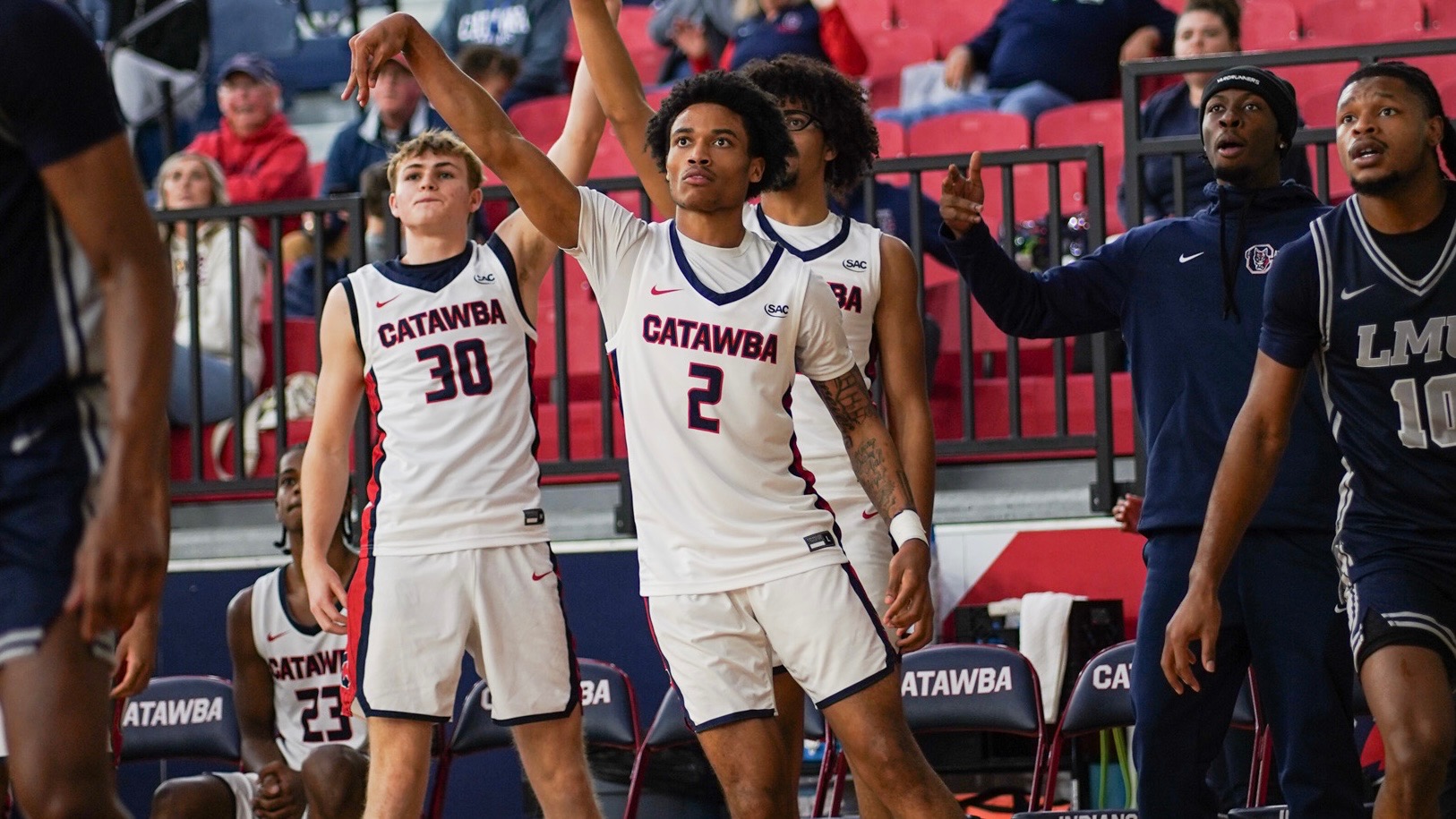 Jordan Simpson watching a three-pointer against LMU