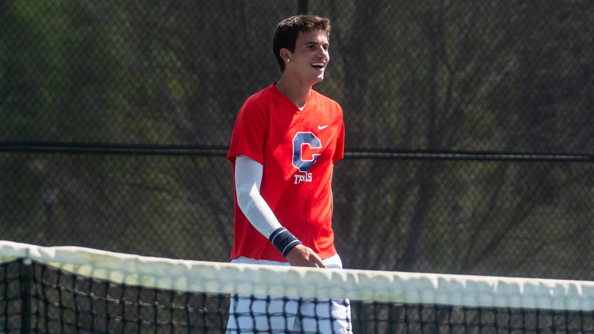 Luca Bergonzi smiling after winning in singles at Tusculum