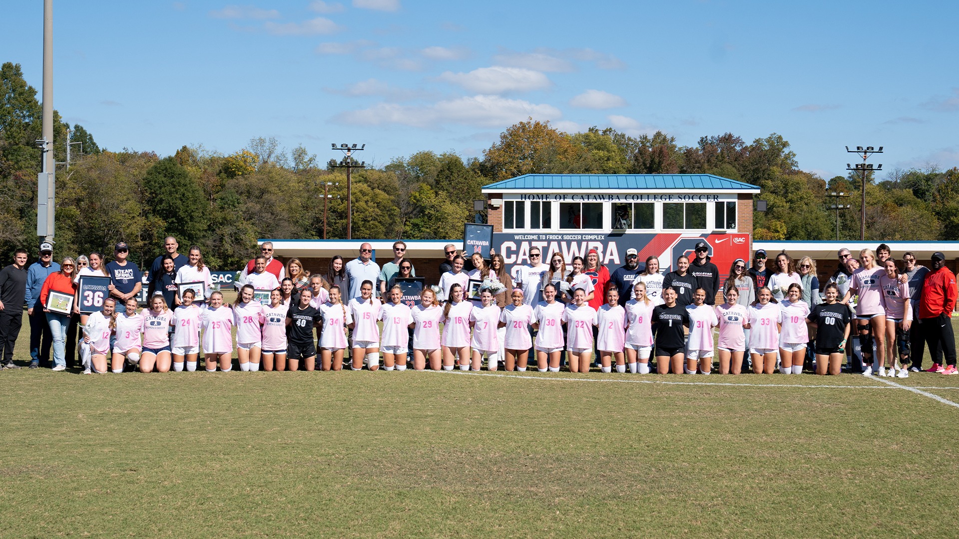 Women's Soccer Senior Day photo with team and senior families