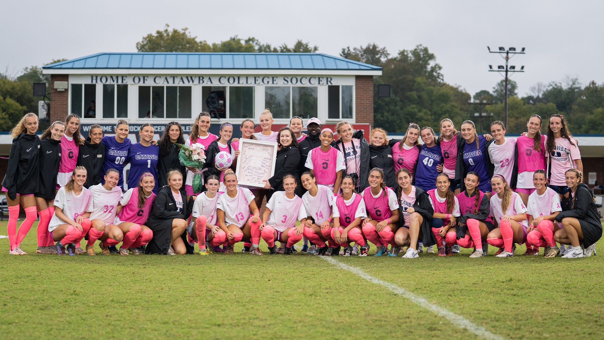 Women's Soccer with Dr. Ashley Schoppe during the program's Breast Cancer Awareness Game