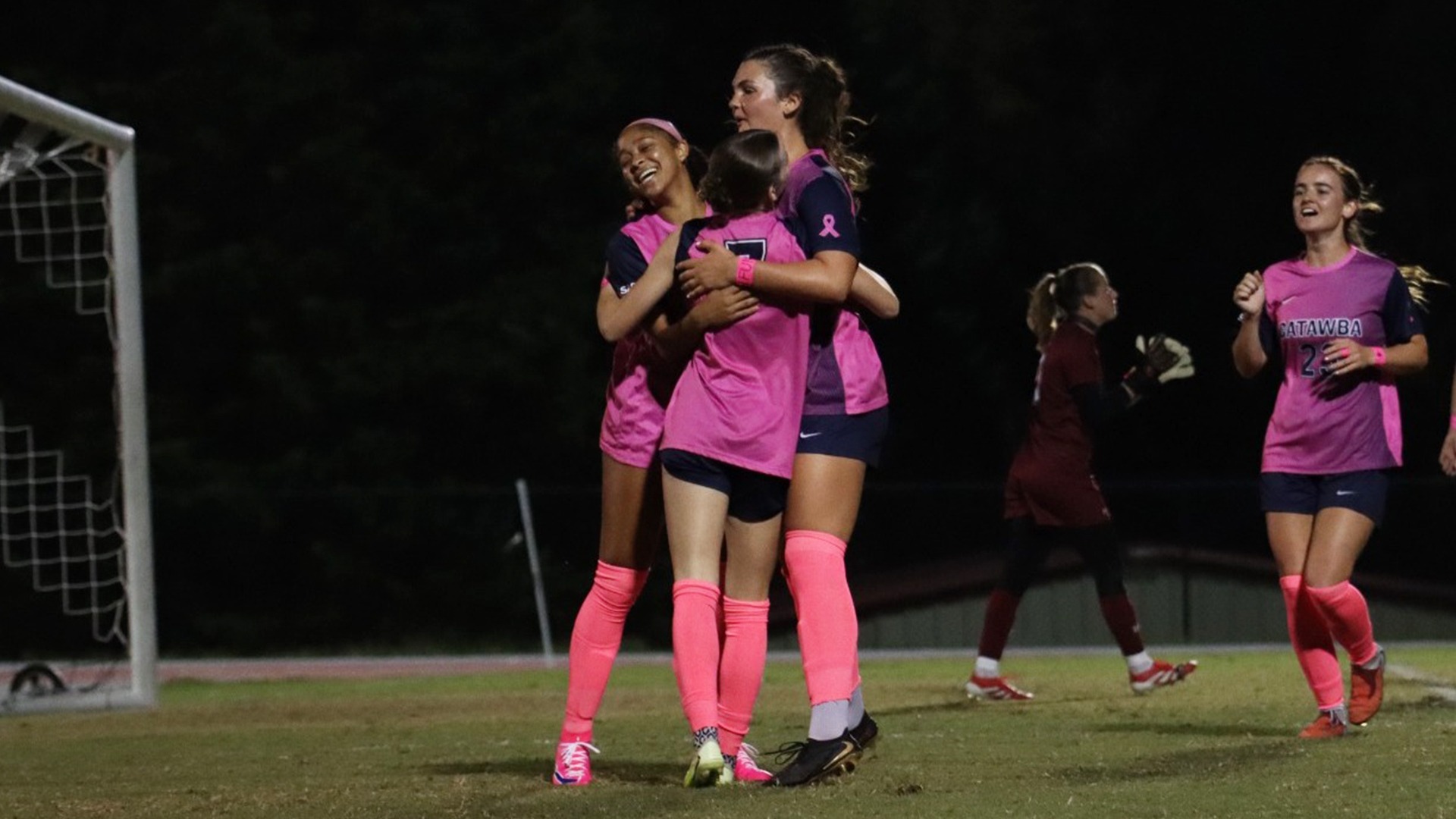 Kennedy McGuire goal celebration with Bree Ehmer and Cadence Setzer