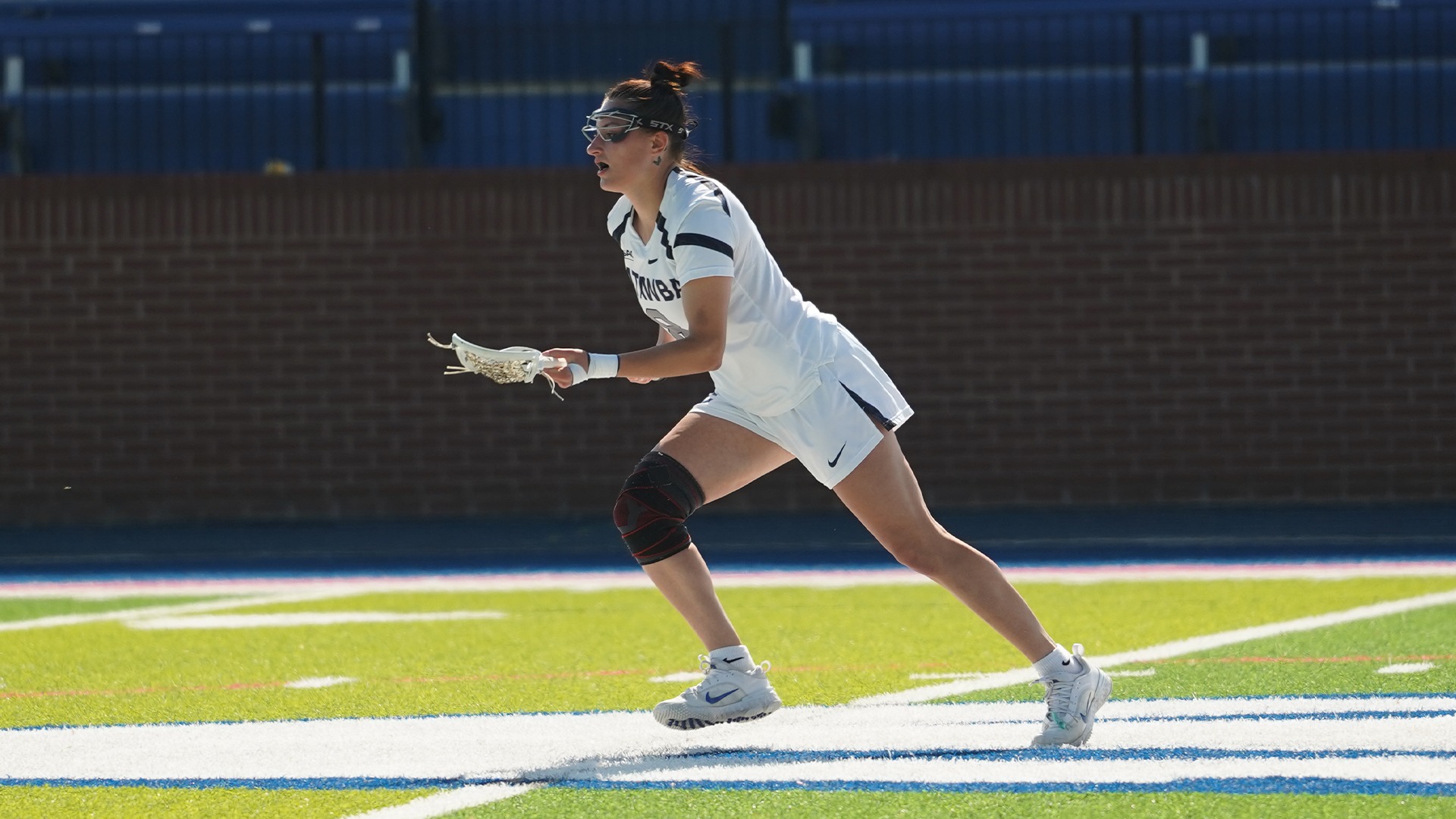 Mary Sorvillo chasing down a ground ball against Montreat