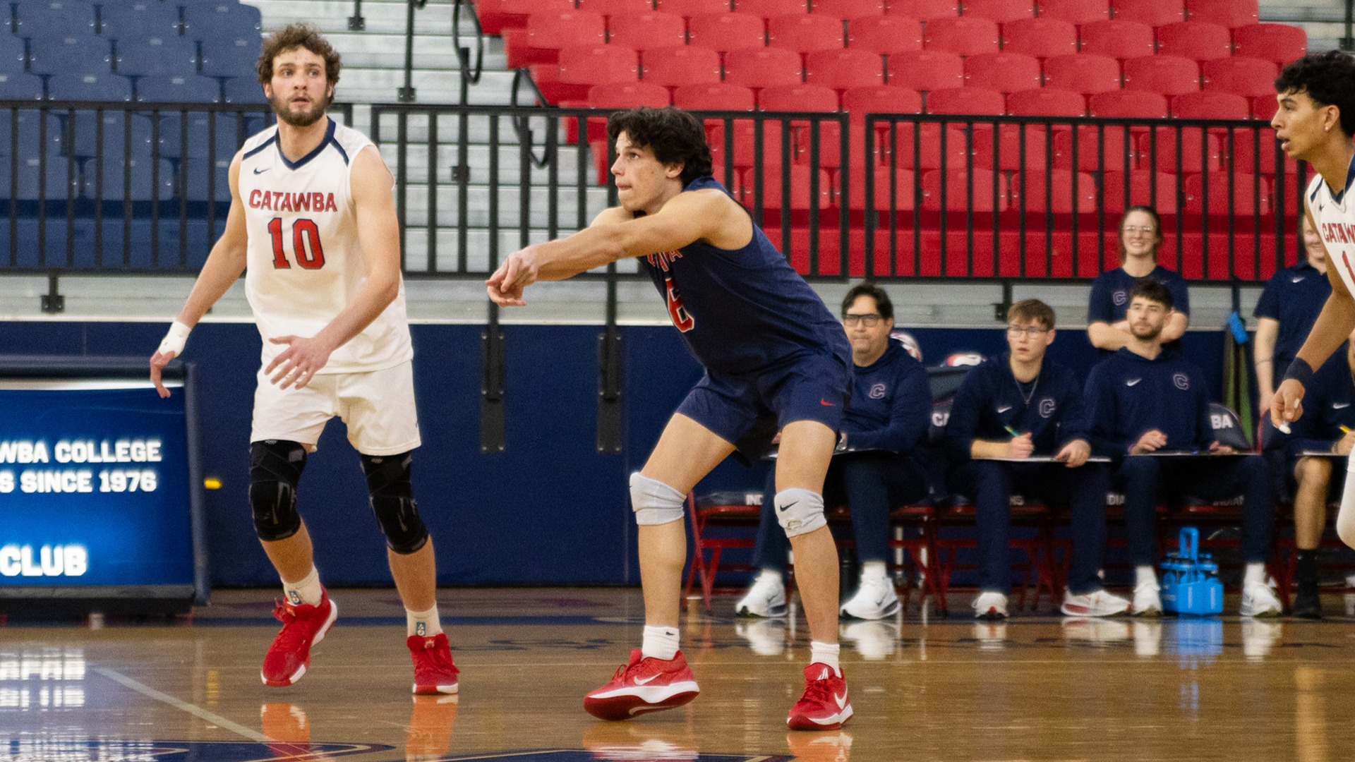 Max Adkisson receiving a serve against Newberry