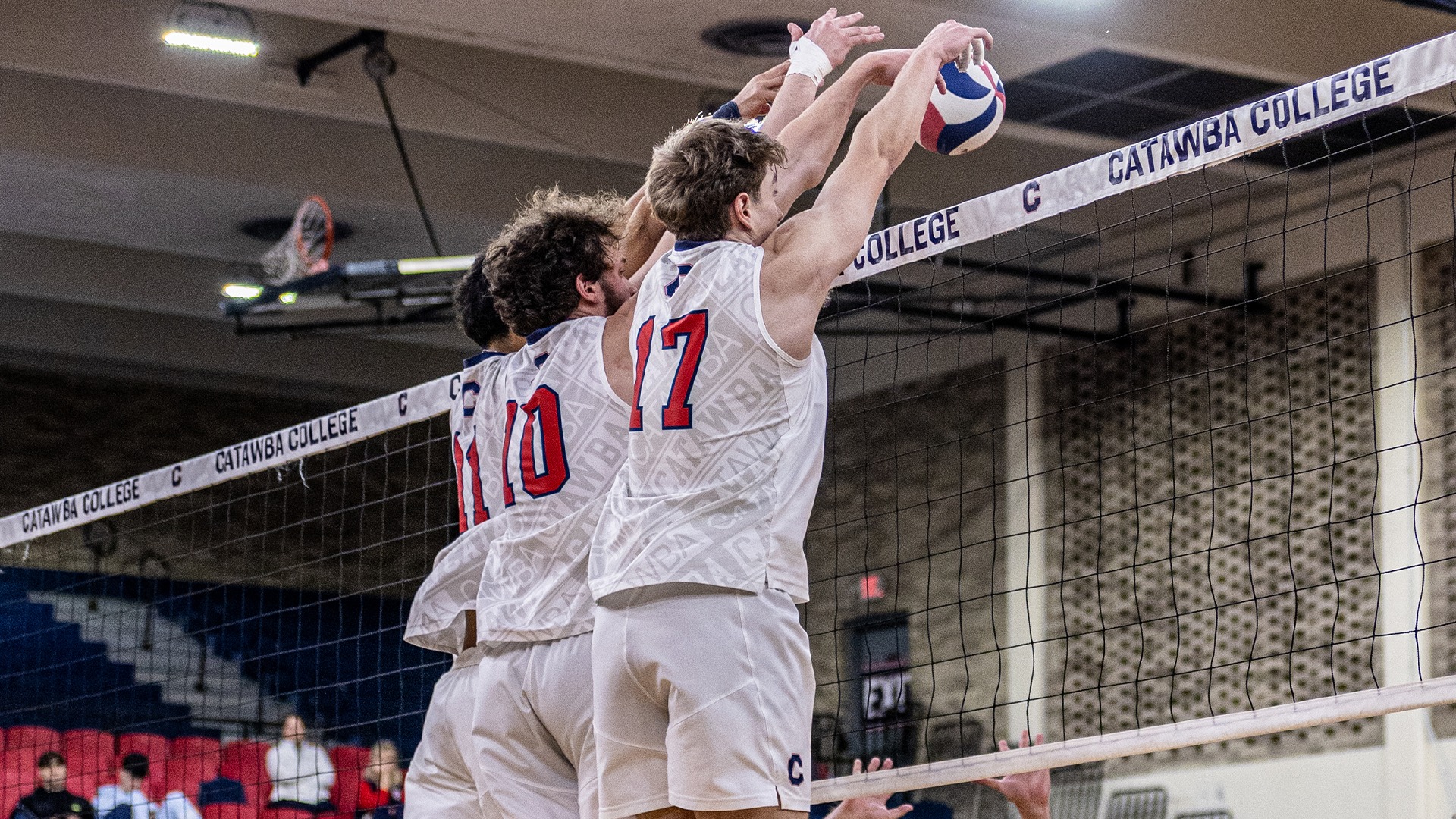 Anders Christianson leads a block against Newberry