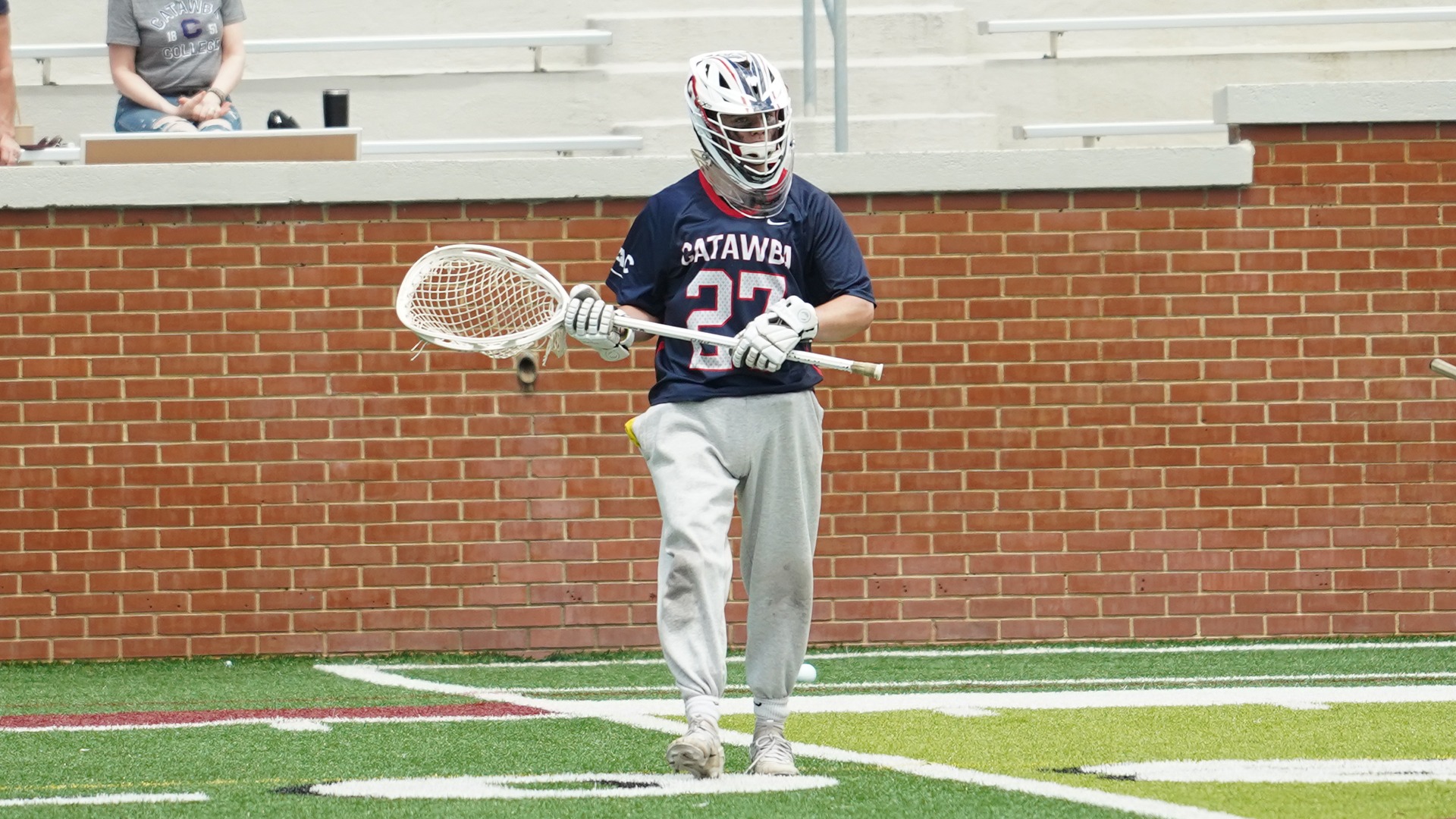 Ben LoPiccolo watching action at Lenoir-Rhyne
