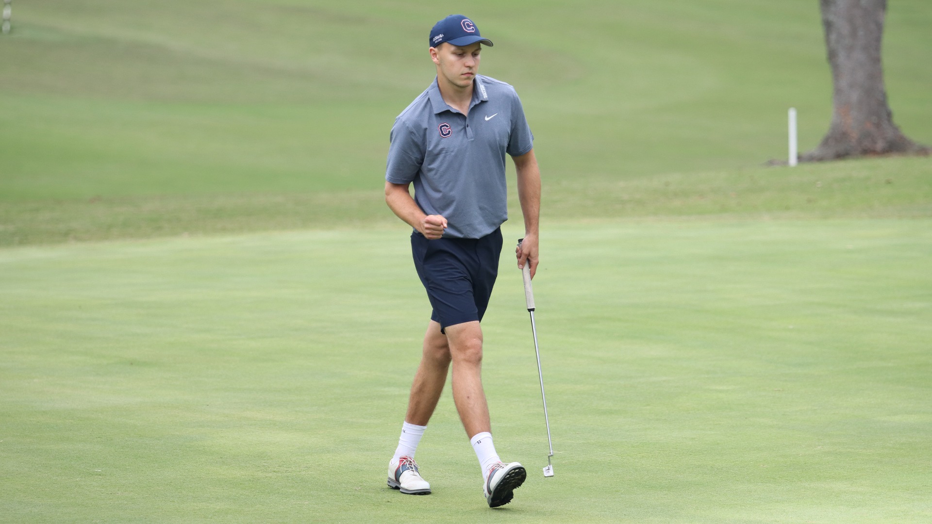 Ilia Antoniadis celebrates his final putt at The Rendleman