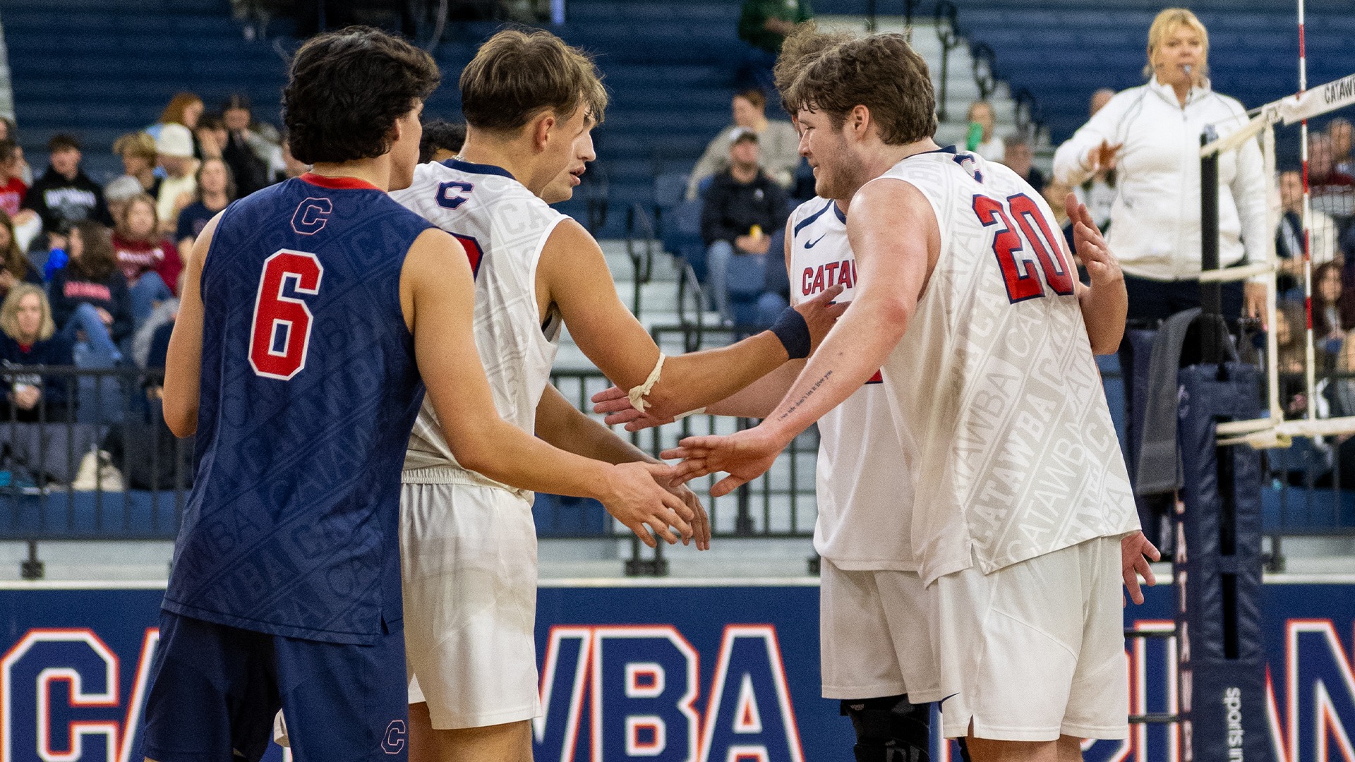 Catawba Men's Volleyball huddles after a rally against Lees-McRae