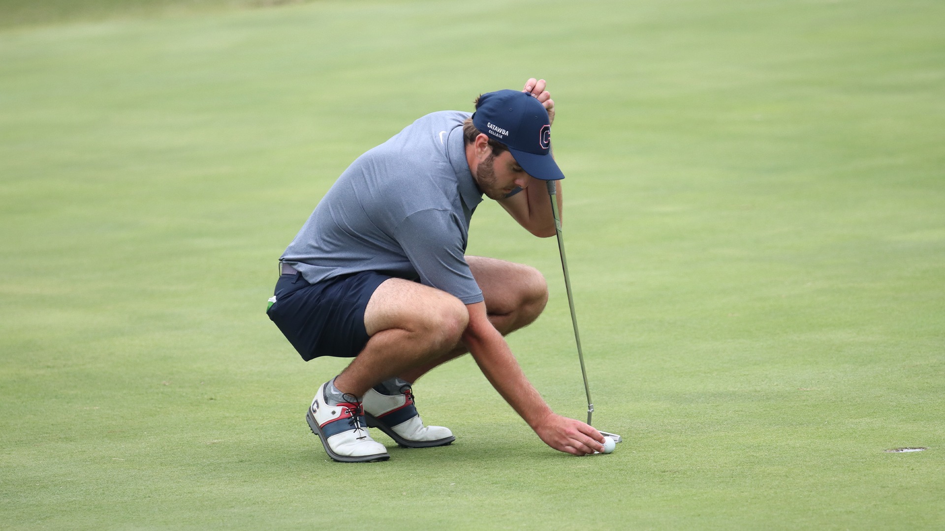 Paul Esnault lining up a putt at The Rendleman