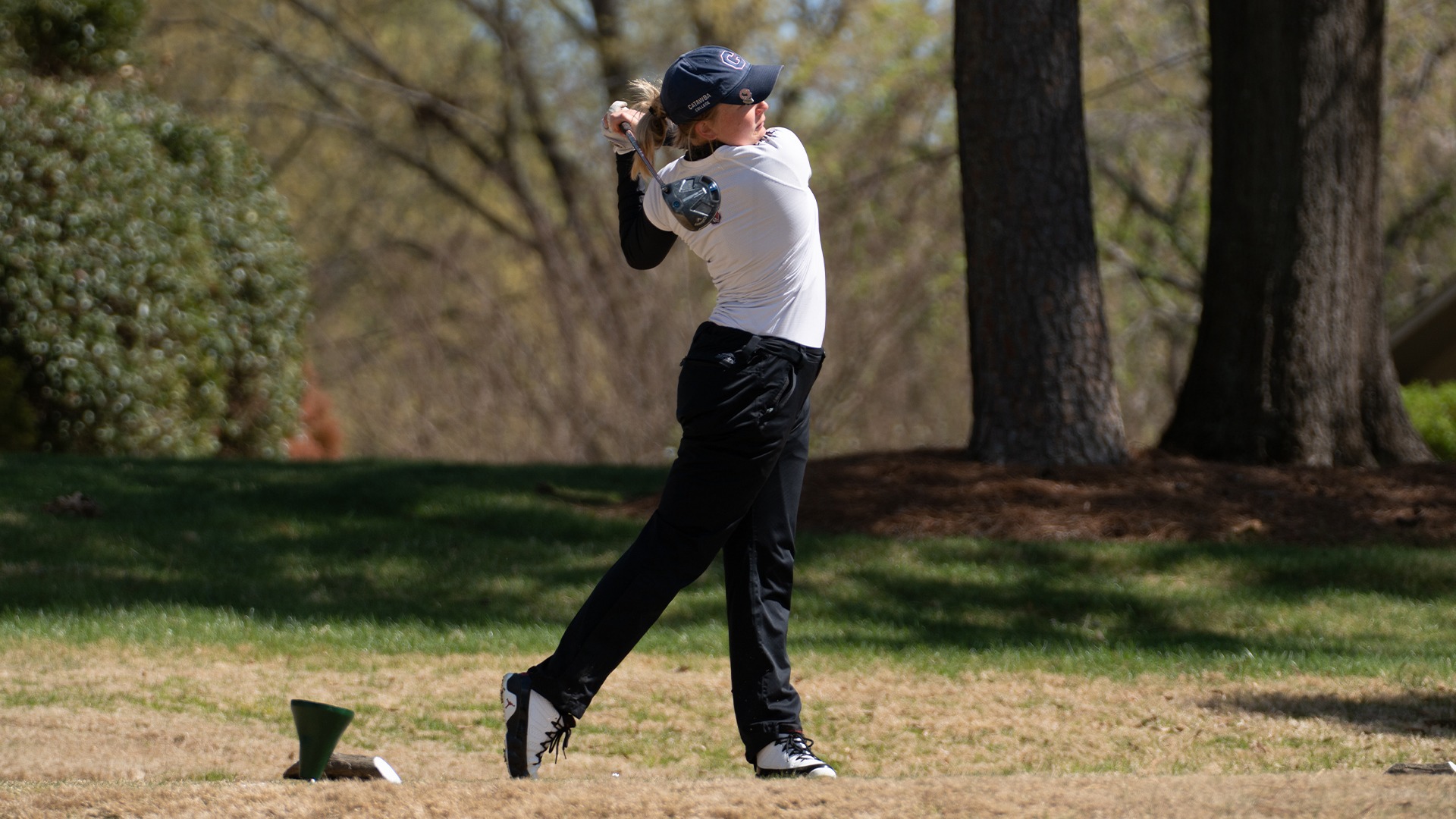 Rachel Carlson teeing off at the Patsy Rendleman Invitational