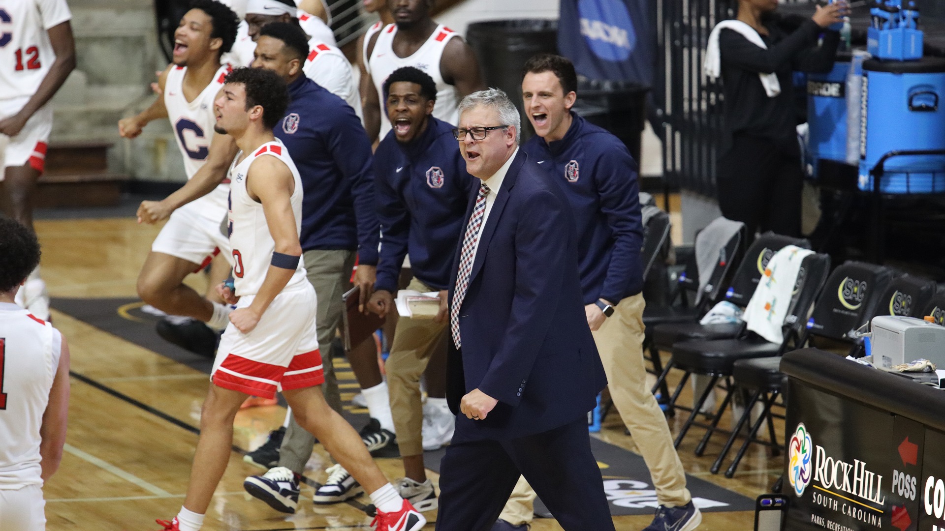 Rob Perron and team celebrate a lead change against UVA Wise