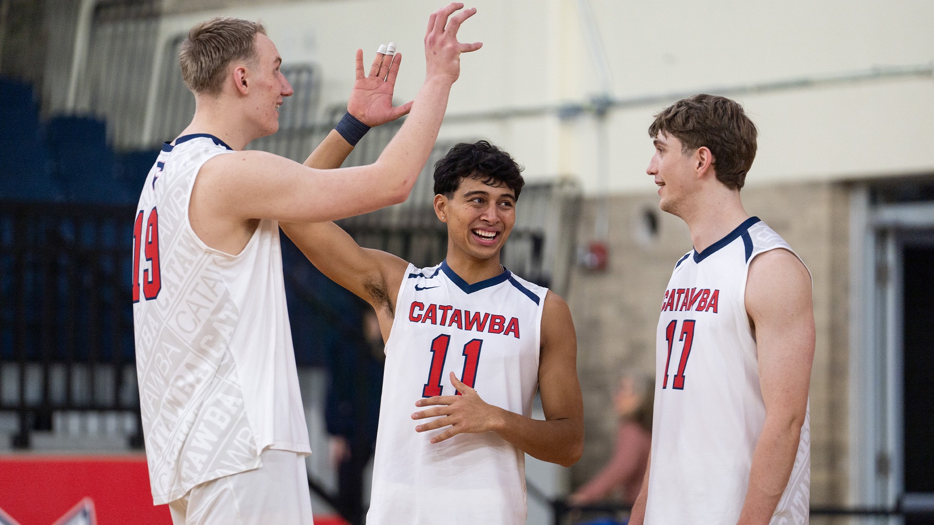Logan Neitzel, Kekona Ulu, and Anders Christianson talking between sets