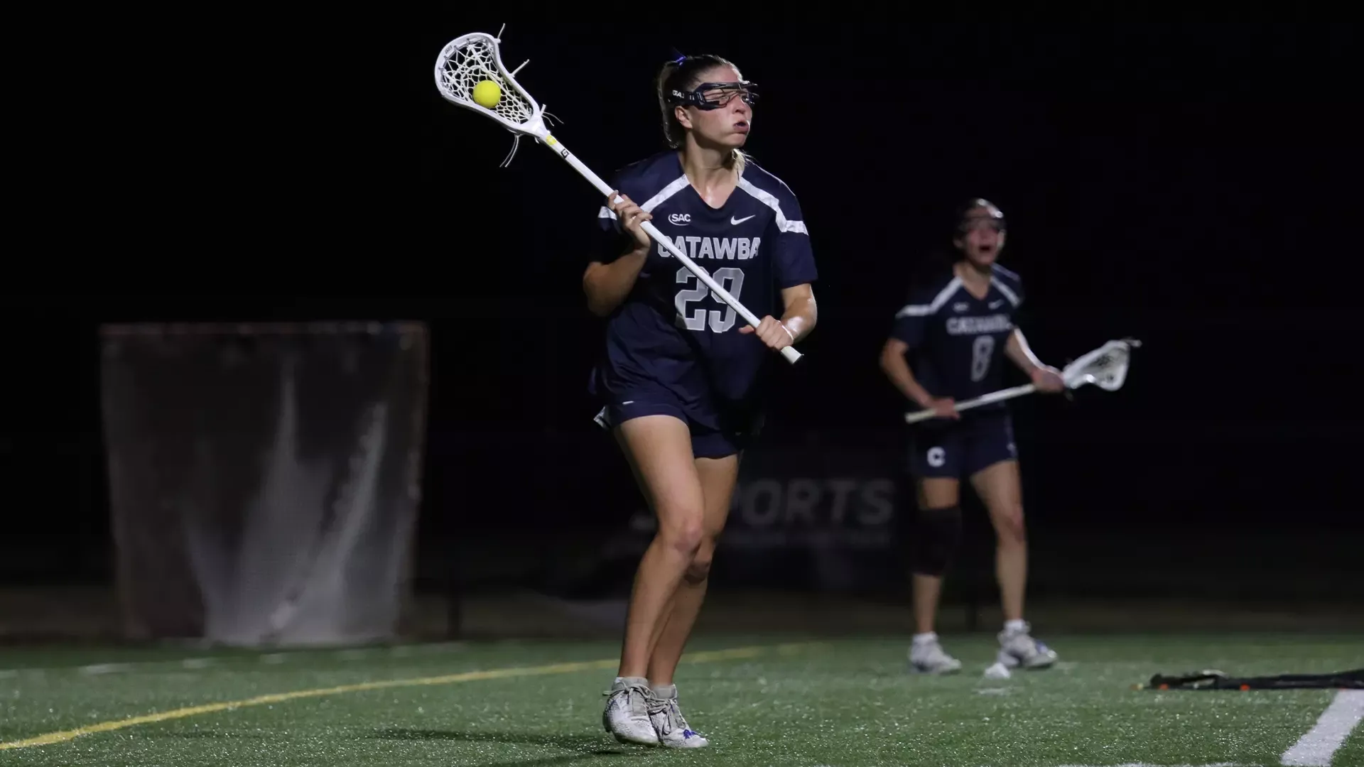 Ava Stanza holds possession, looking for a pass target at Coker