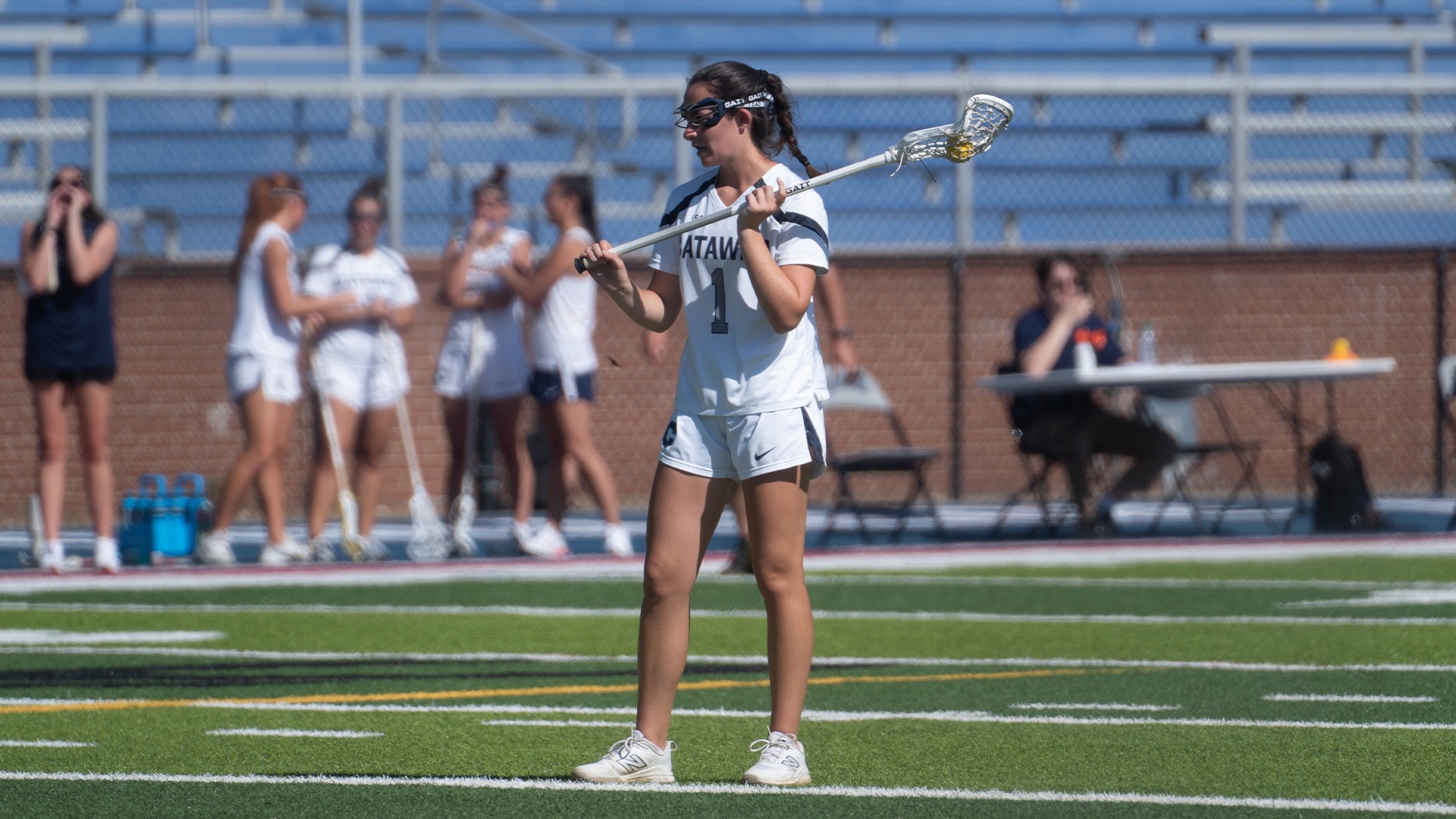 Maddie Fox holding possession in the offense