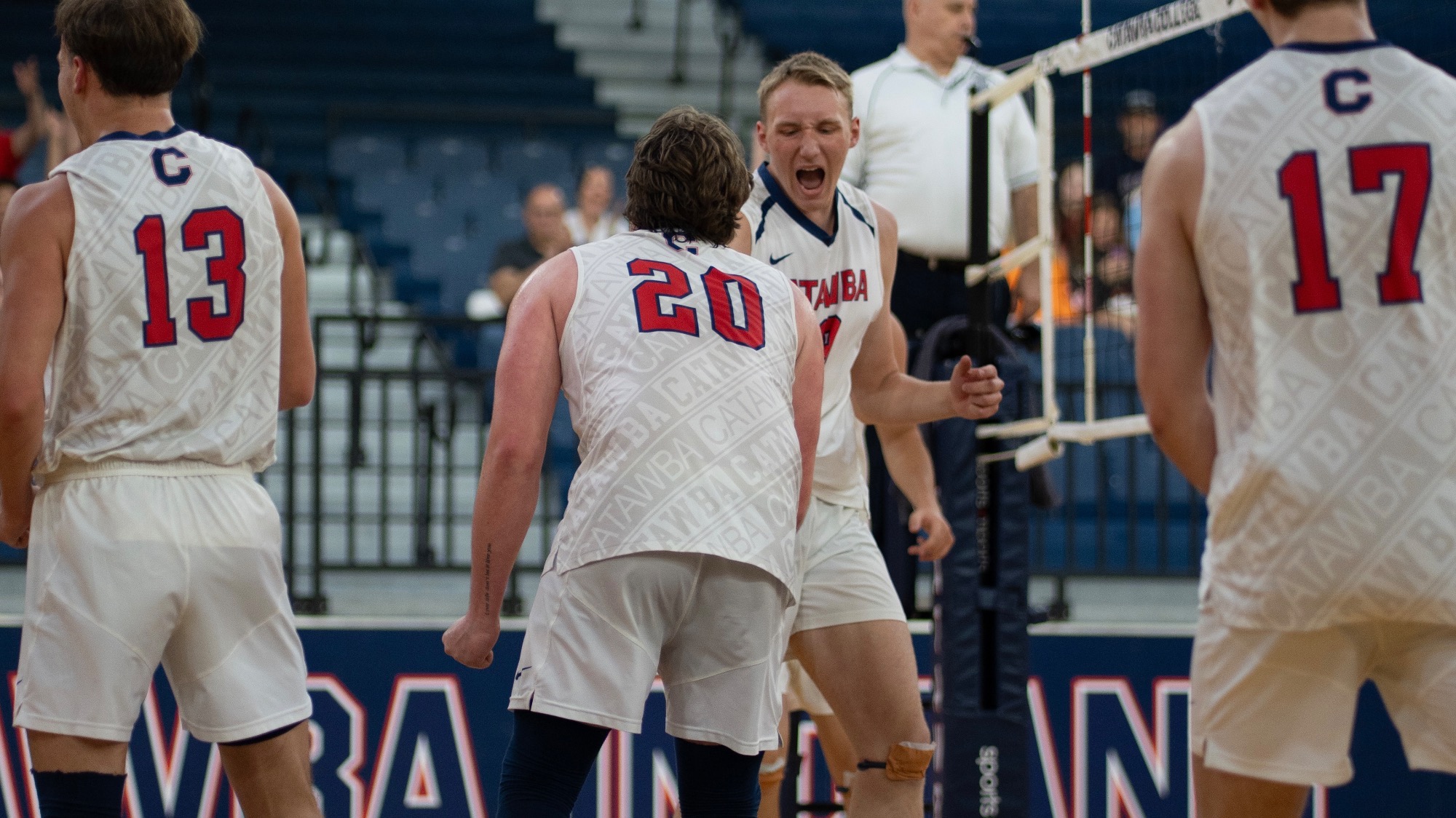 Logan Neitzel celebrating with Kristian Smith after a point