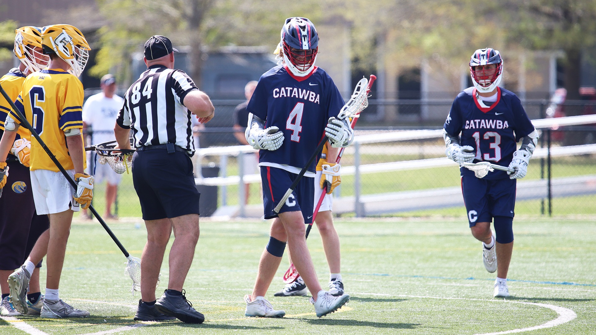 Tanner Stout bows his head after scoring a goal at Coker