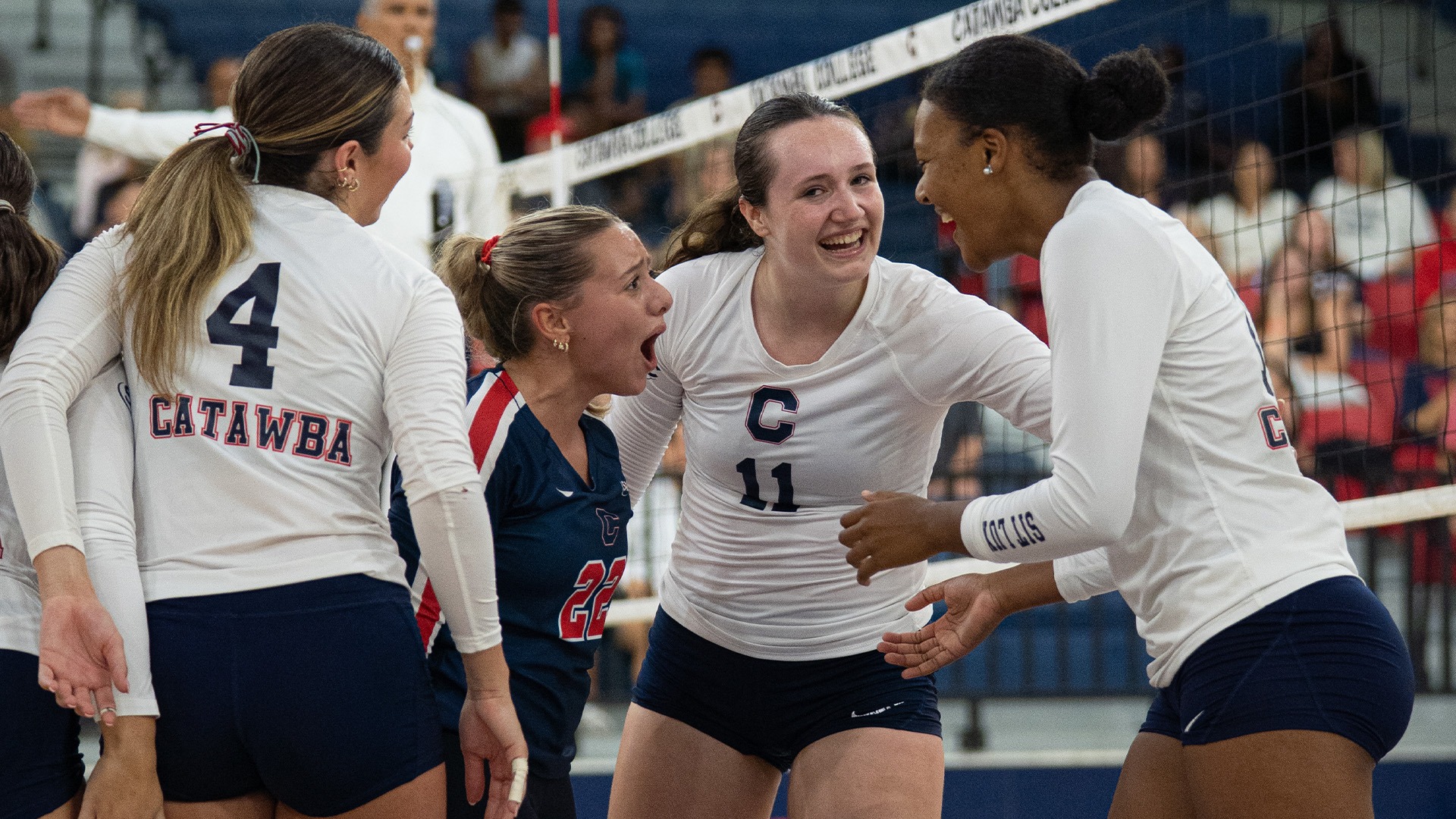 Catawba Women's Volleyball celebrates a point against Davis & Elkins