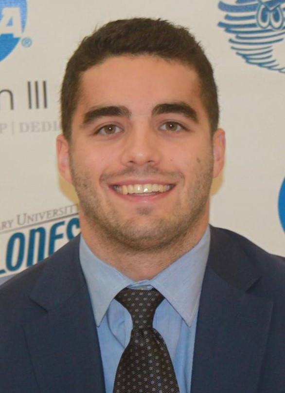 Michael Schroback (head and shoulders mug shot in coat and tie)
