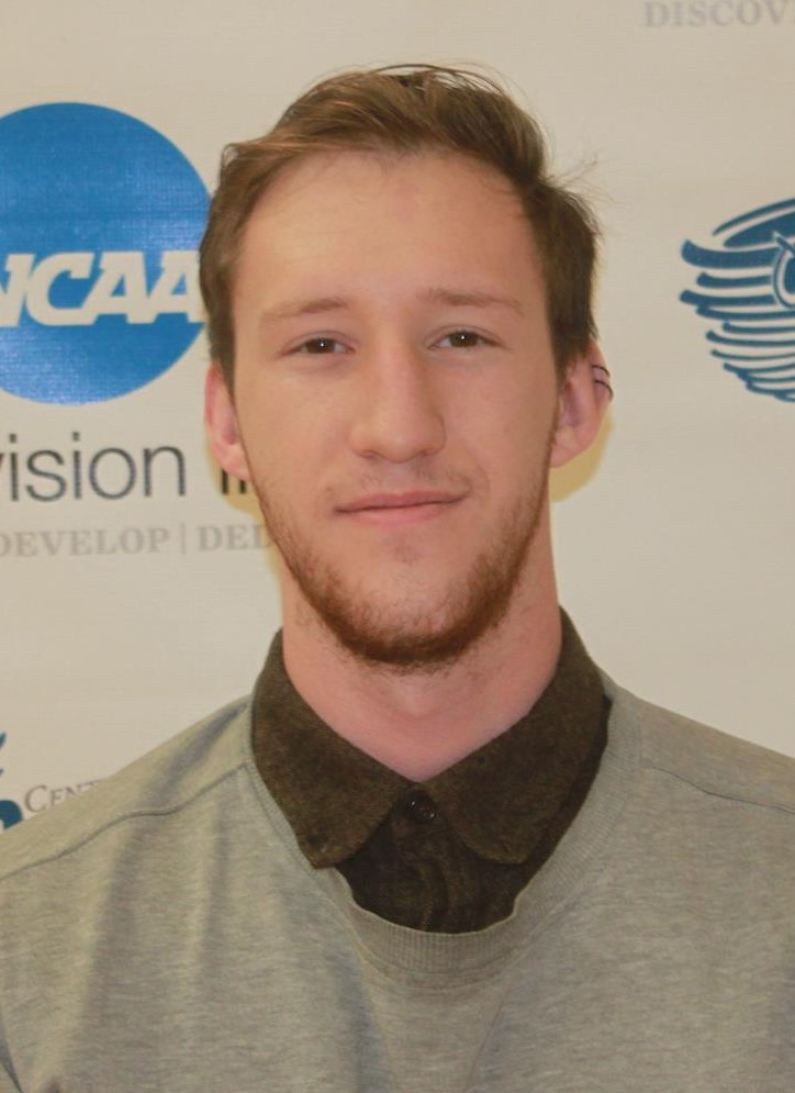 Kevin Zoellner (head and shoulders mug shot in a sweater and button down shirt)
