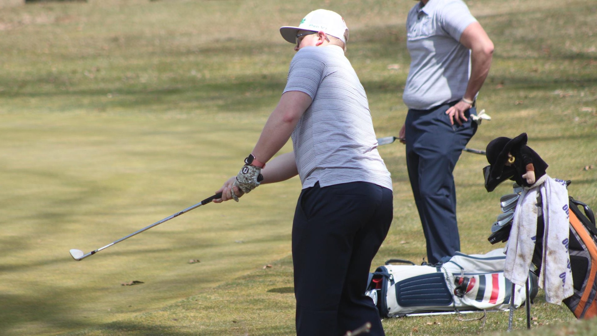 Jerome Beyer Jr. follows through on a putt