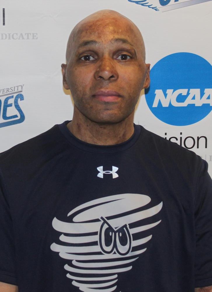 William Crowell II (headshot of the cross country coach)