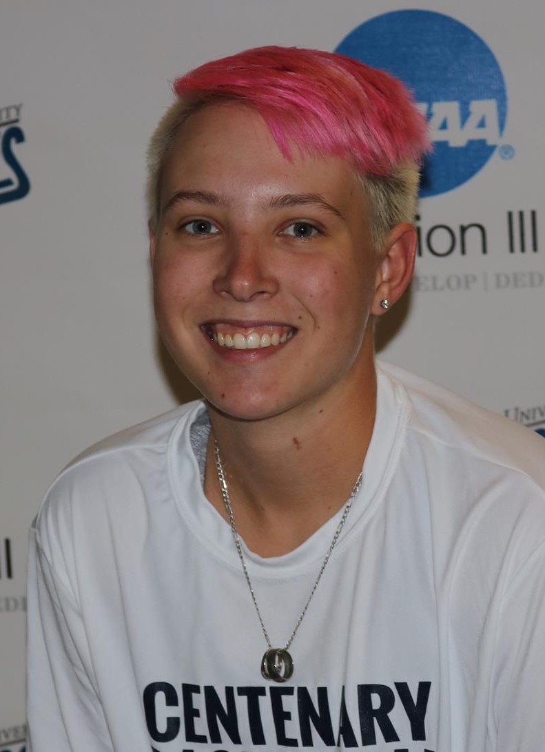 Tanya Elsbree (head and shoulders mug shot in a white Centenary basketball t-shirt)