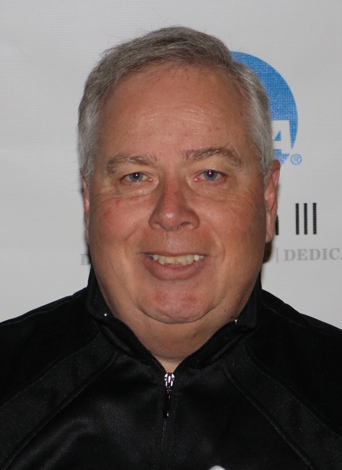 Len Kunz (head and shoulders mug shot in a black golf shirt)