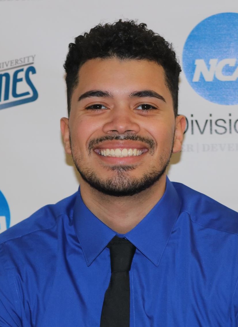 Bryant Cordova (head and shoulders mug shot in a blue dress shirt and blue tie in front of the Centenary Cyclones backdrop)