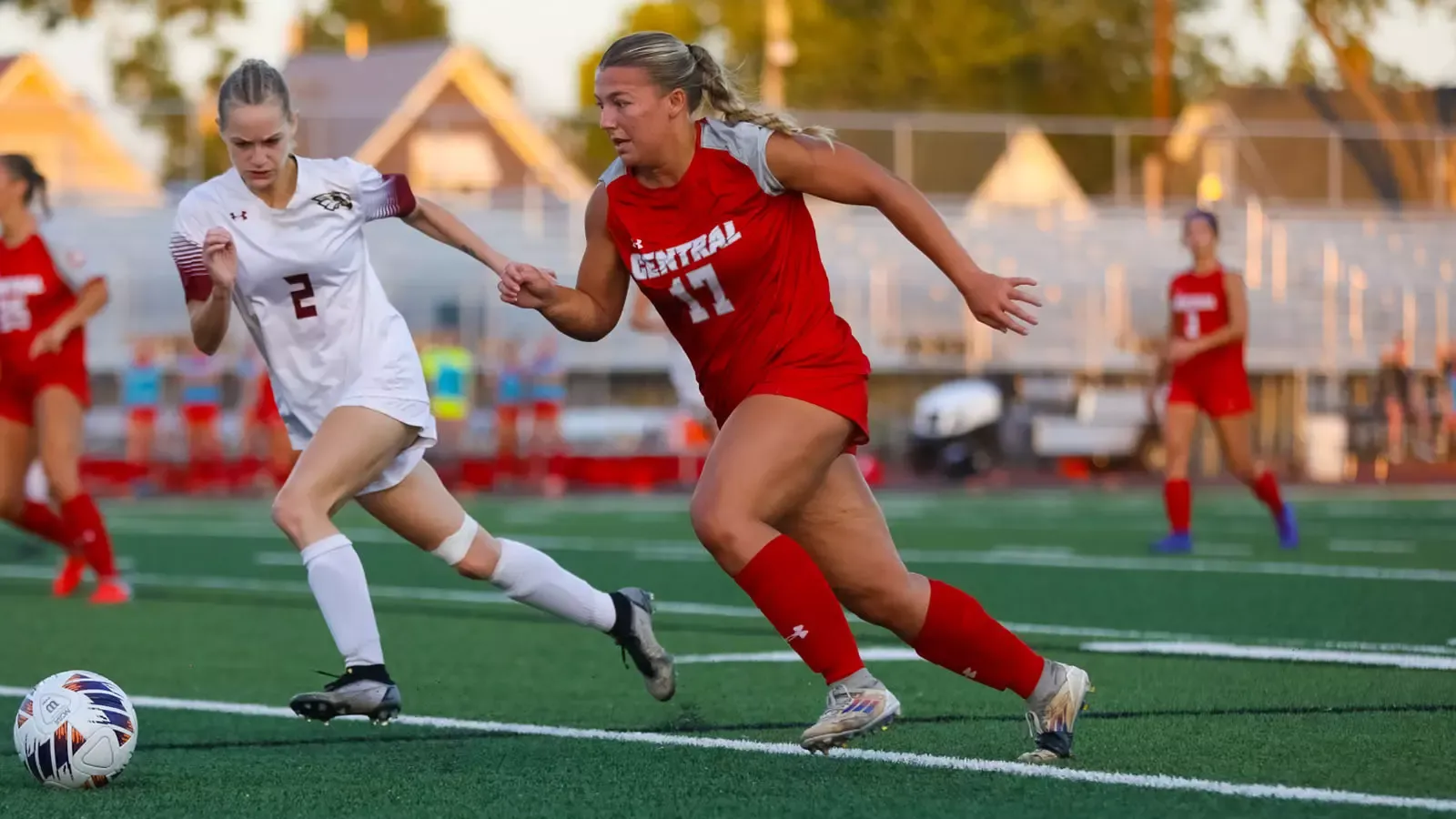 Olivia DeVos fights for the ball